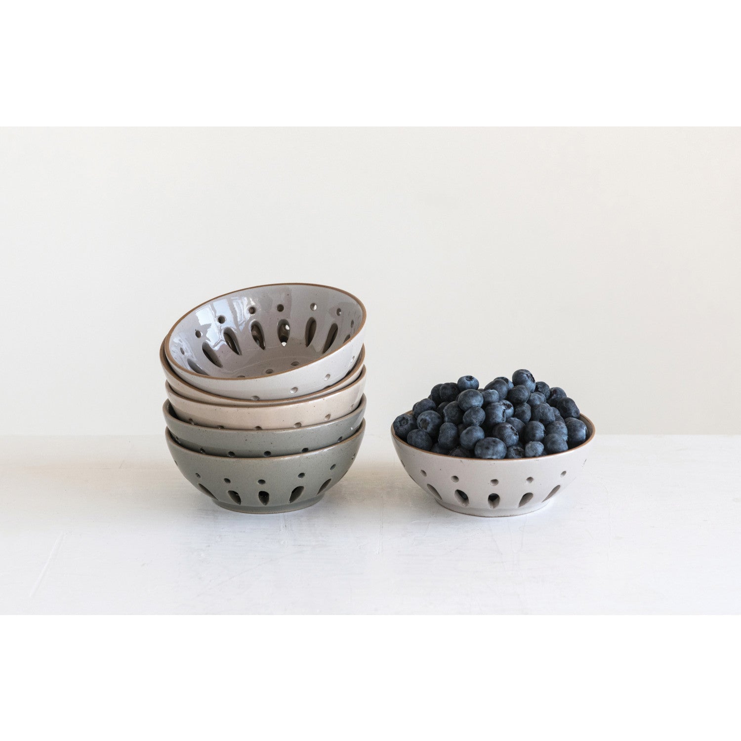 stoneware berry bowl. Variety of colors, perfect for serving fruit and decorating your kitchen.